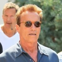 Arnold Schwarzenegger seen leaving Cafe Roma
